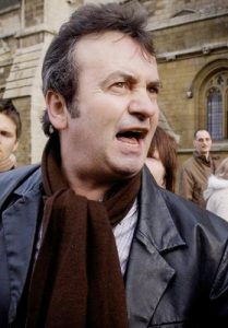 RIP: The late Gerry Conlon pictured outside the Houses of Parliament in 2000. He was there to witness the Blair apology for his and other wrongful imprisonments.