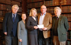 SLIGO: Leo Leydon, President of Sligo Field Club, presents a cheque for €600 to Prof. Mary Daly, President of the Royal Irish Academy, in the presence of Prof. Ruairi P hUiginn, NUI Maynooth and organiser of the Conference; Siobhan Fitzpatrick, Librarian of RIA; and Martin A. Timoney, a frequent archaeological researcher in the Academy's Library.